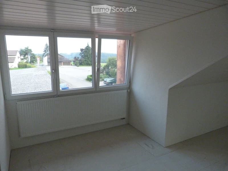 empty room with sliding window, heater, empty corner, street view