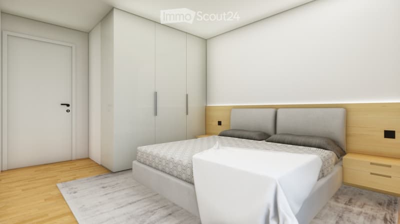 Modern design with gray linen headboard, two pillows, wooden floor, white walls, wardrobe, nightstands with drawers, large bed
