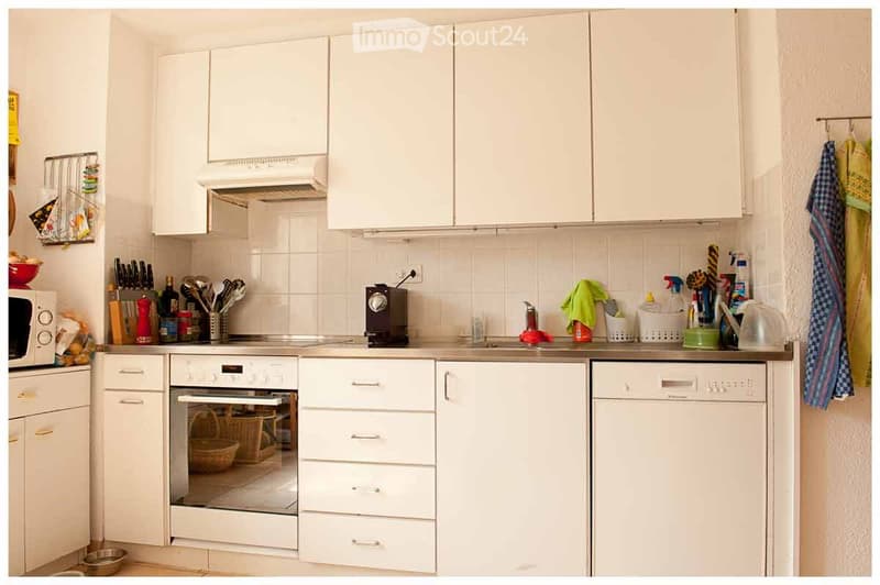 {"type": "Kitchen", "objects": ["microwave", "oven", "dishwasher", "coffee maker", "knife block", "bottle", "cup", "bowl", "faucet", "cupboard", "drawer", "bottle", "cup", "cupboard", "cupboard", "cupboard", "cupboard", "cupboard", "cupboard", "cupboard",