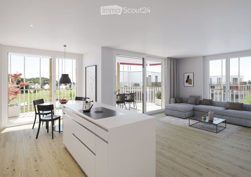 Modern open-plan living and dining area with a grey sectional sofa, coffee table, kitchen island, dining chairs, and a view to a balcony.