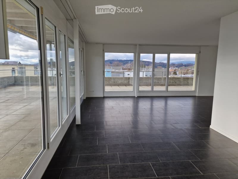 tiled floor, large sliding glass doors, balcony with railing, city view