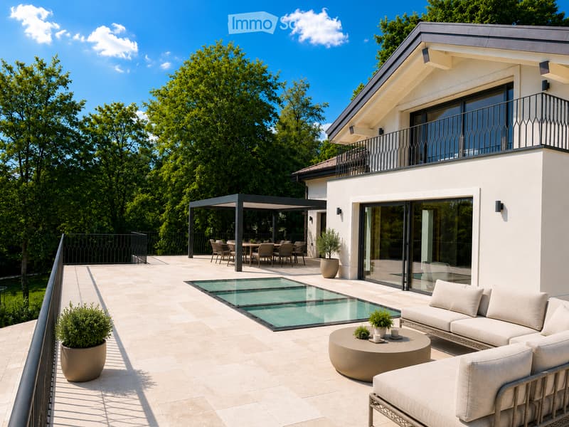 Modern outdoor patio with a swimming pool, white sofa, coffee table, dining area, and potted plants, connected to a house with a balcony and large windows.