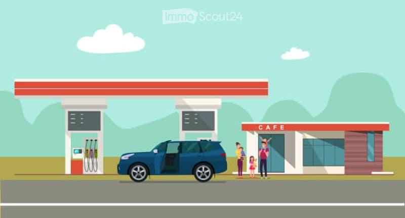 A stylized illustration of a gas station with a blue SUV parked at a fuel pump, a small cafe building, and a few people nearby.