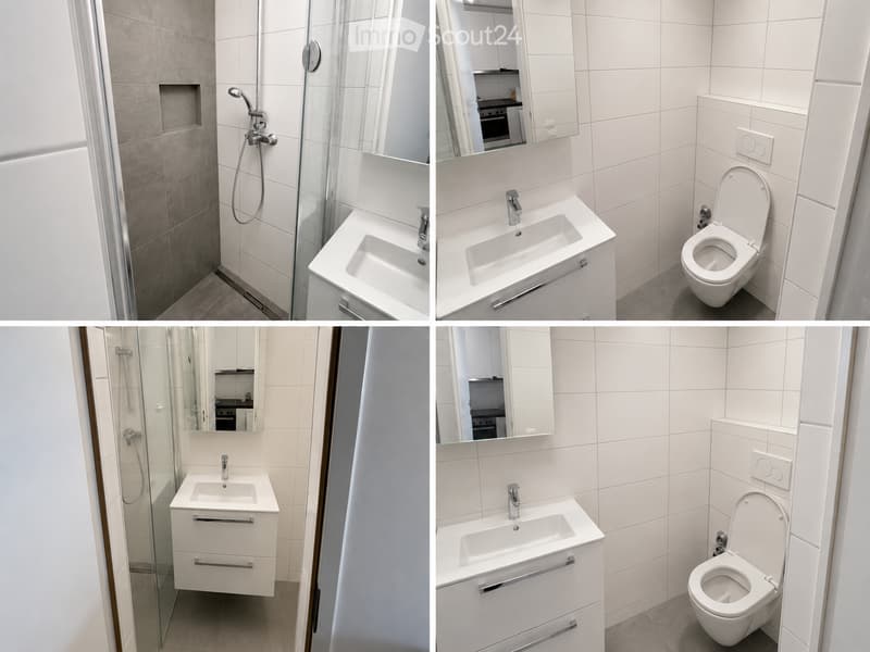 Modern bathroom with white tiles, a glass-enclosed shower, a double sink vanity, and a toilet. The space is bright and clean with a sleek design.