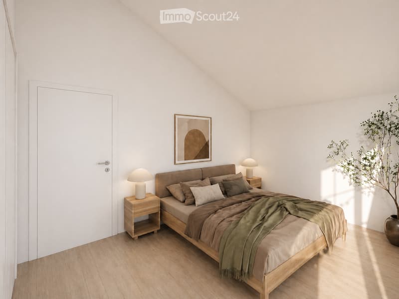 Modern bedroom with a wooden bed, nightstands, lamps, and a decorative plant in a vase. The room features light-colored walls and wooden flooring.