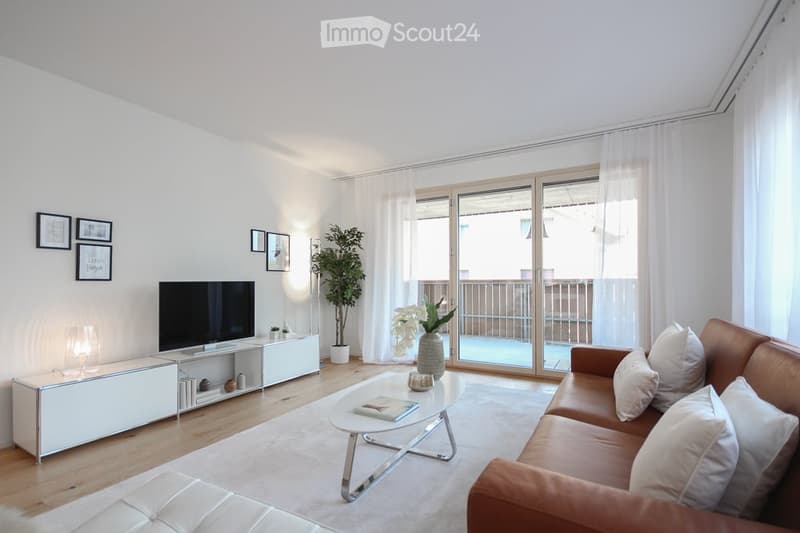 white walls, wooden floor, white couch, white pillows, white coffee table, white rug, white entertainment center, flat screen TV, white curtains, balcony