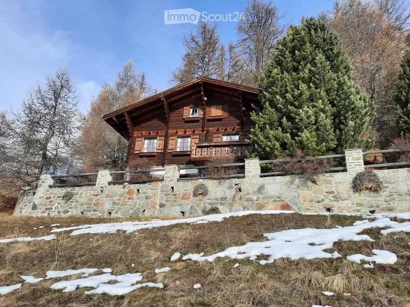 wooden house, stone wall, balcony, snowy ground