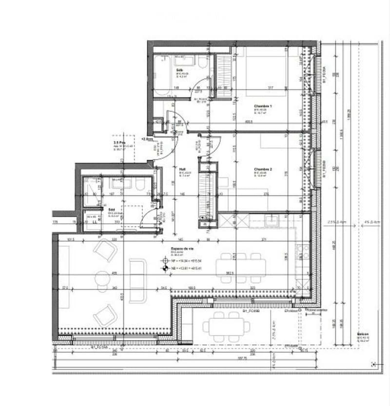 Floor plan of a residential building showing multiple rooms including living room, dining room, kitchen, bedrooms, bathrooms, and a balcony.