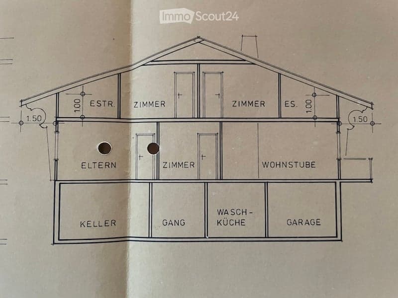 Floor plan of a house with labeled rooms including living room, bedrooms, kitchen, garage, and basement.