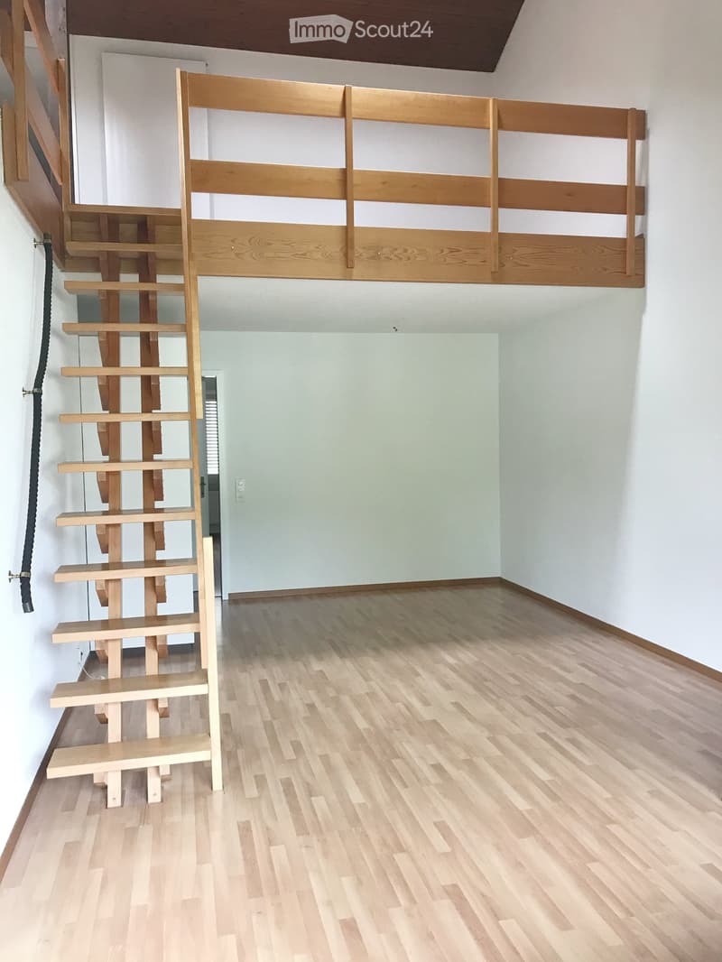 {"visible_features": ["Raised ground floor"],    "type": "Room",    "description": "empty room with wooden stairs and wooden loft",    "localized_descriptions":        {        "EN": "Empty room with wooden stairs and wooden loft",        "DE": "Lee