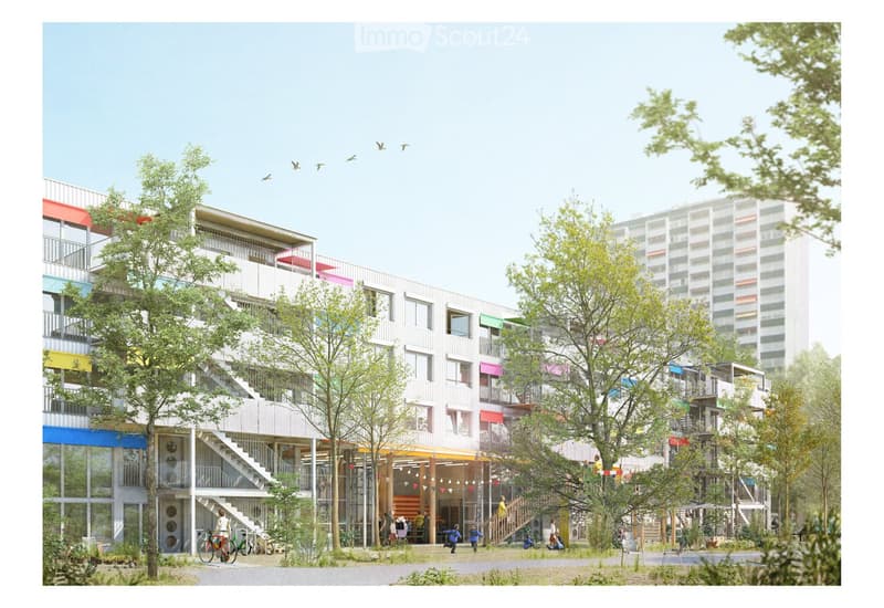A modern multi-story residential building with colorful facades, balconies, and a central staircase leading to a communal area surrounded by trees and greenery.