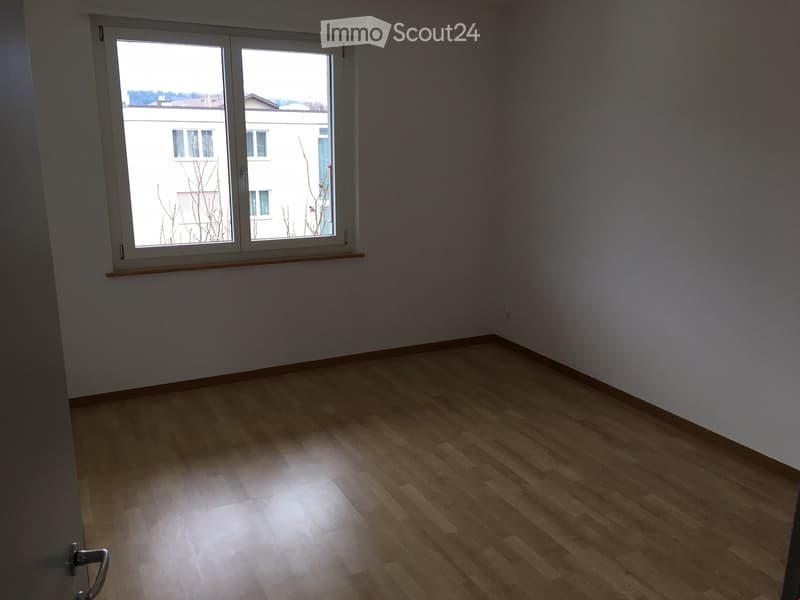 empty room, hardwood floor, white walls, large window