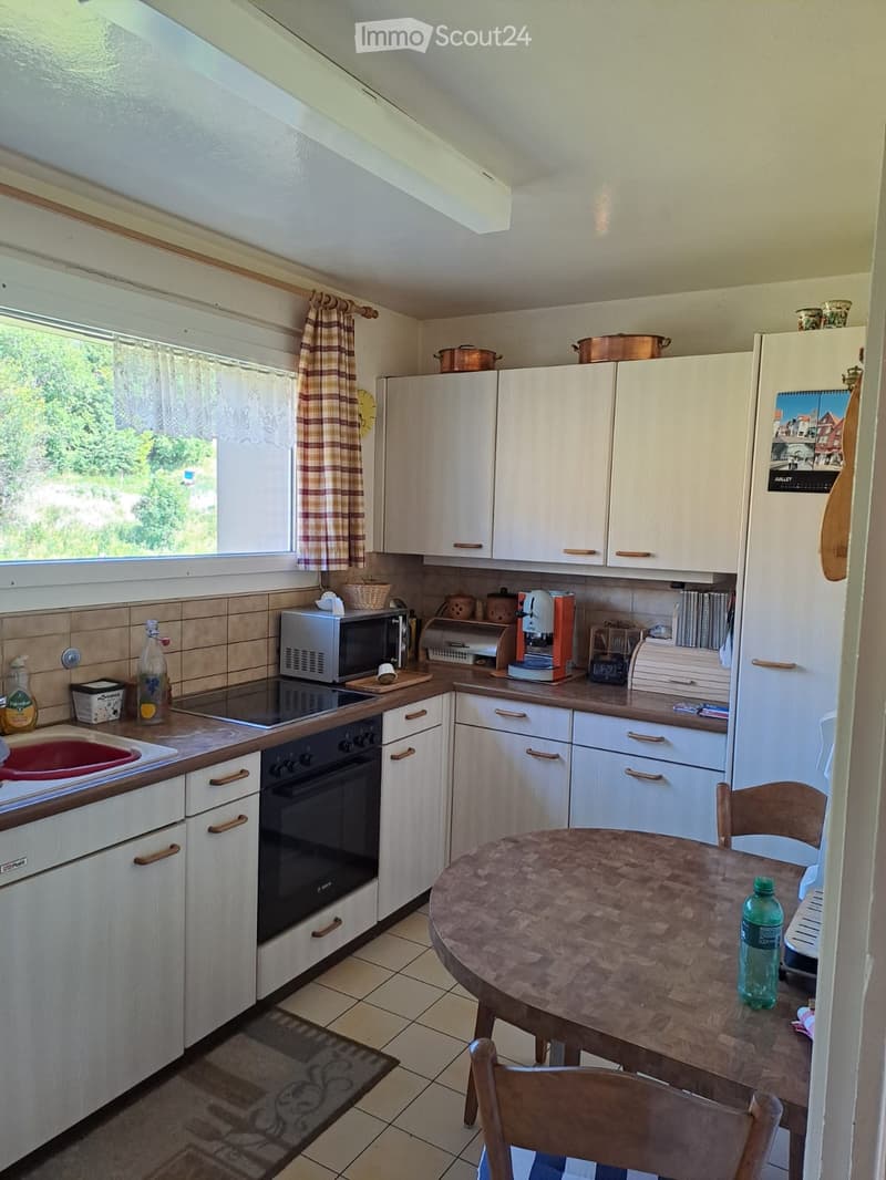 {"type": "Kitchen", "objects": ["refrigerator", "microwave", "oven", "coffee maker", "table", "chair", "bottle", "cup", "pot", "sink", "faucet", "oven mitt", "oven", "oven", "oven", "oven", "oven", "oven", "oven", "oven", "oven", "oven", "oven", "oven", "