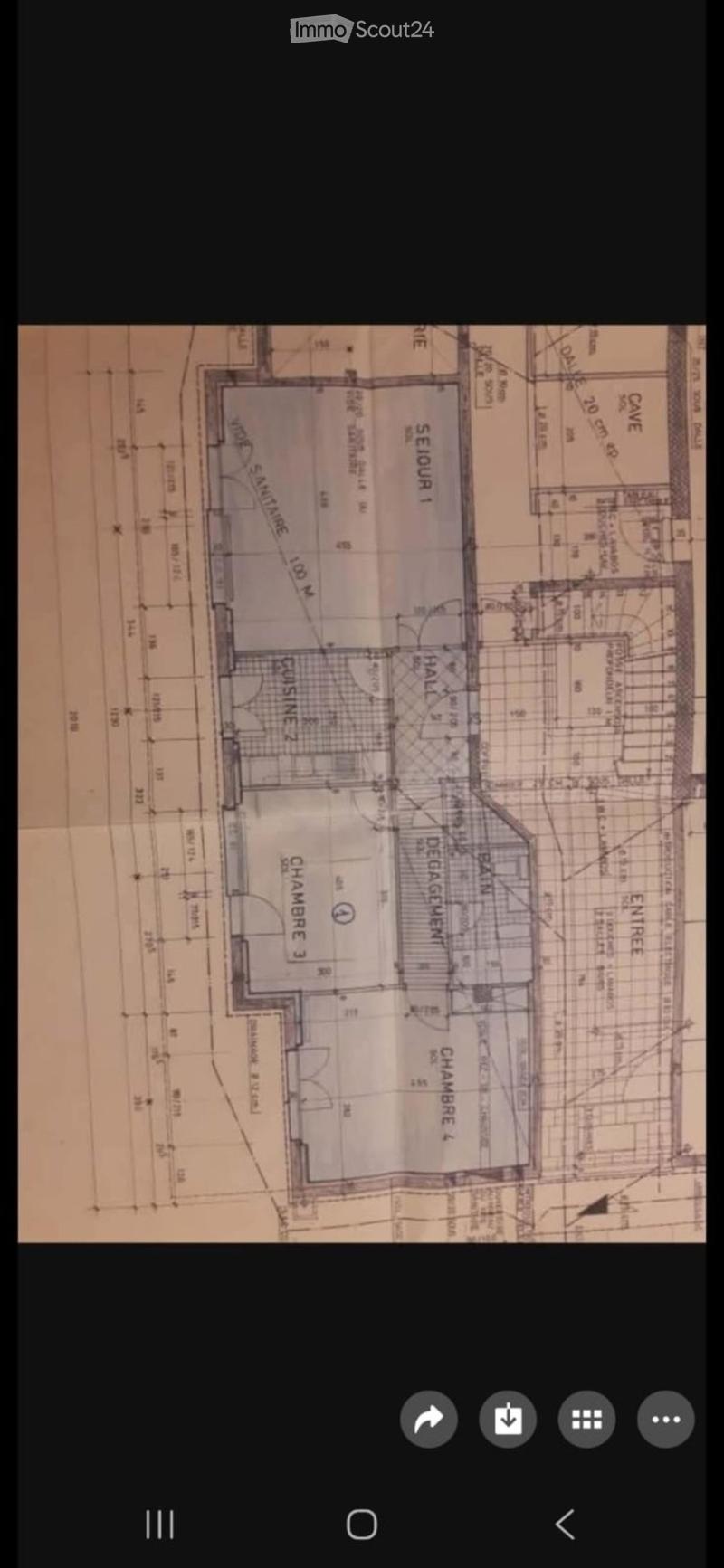 Floor plan showing a layout with labeled rooms including a hall, kitchen, bathrooms, and bedrooms.