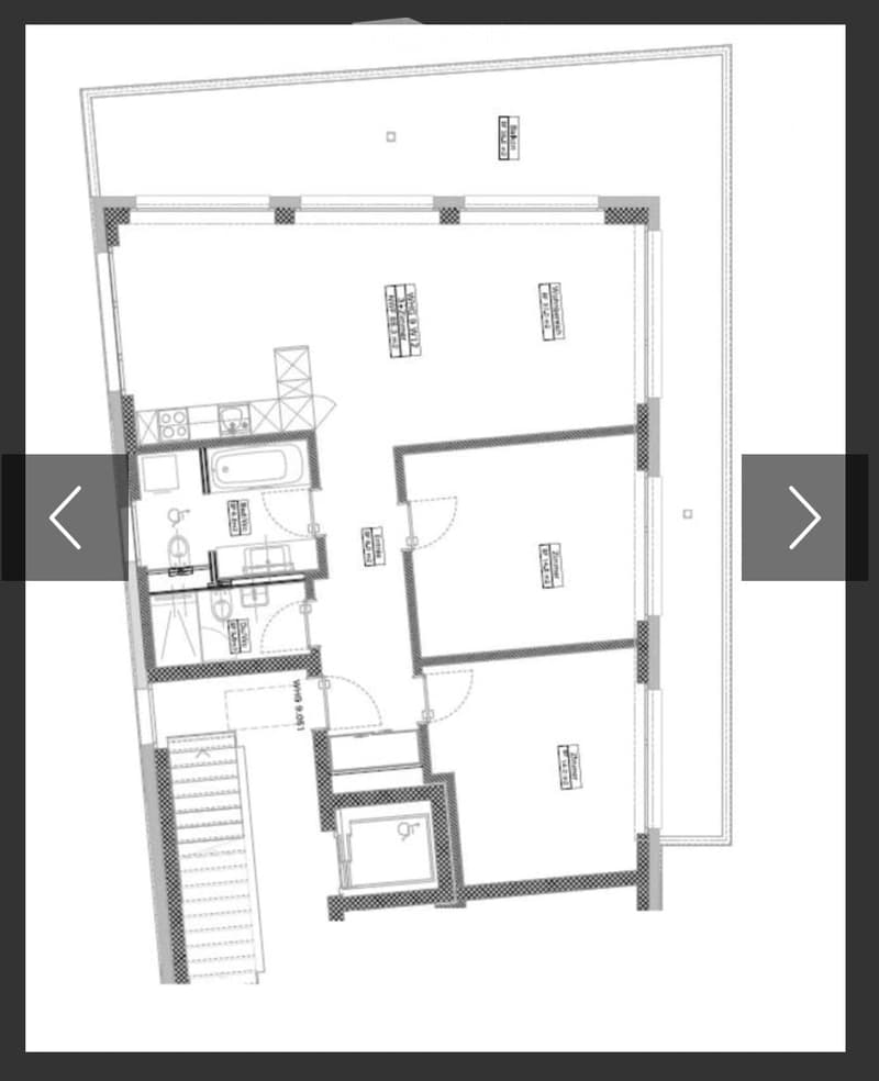 Floor plan showing a two-story house layout with living room, dining room, kitchen, bedrooms, bathrooms, and a staircase leading to the upper level.