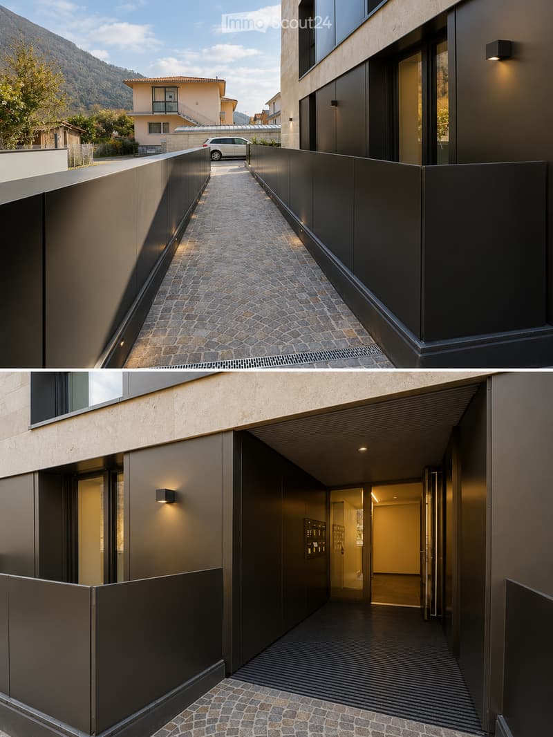 Modern, sleek corridor with dark stone cobblestone flooring, black metal walls, and integrated lighting. Features a secure door and a view of a modern building entrance.