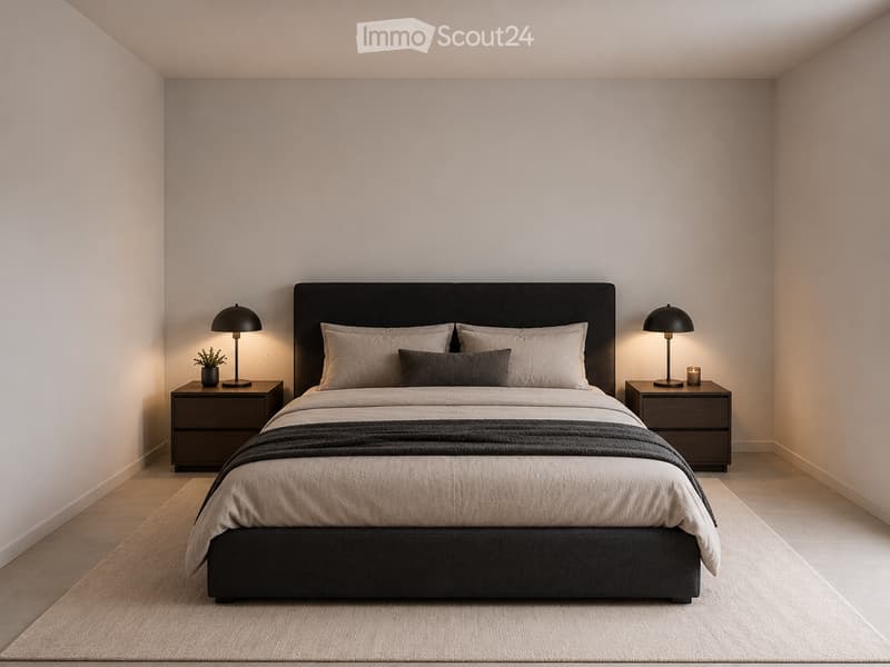 Modern bedroom with a large bed, nightstands, lamps, and a small potted plant. The room features light-colored walls and a wooden floor.