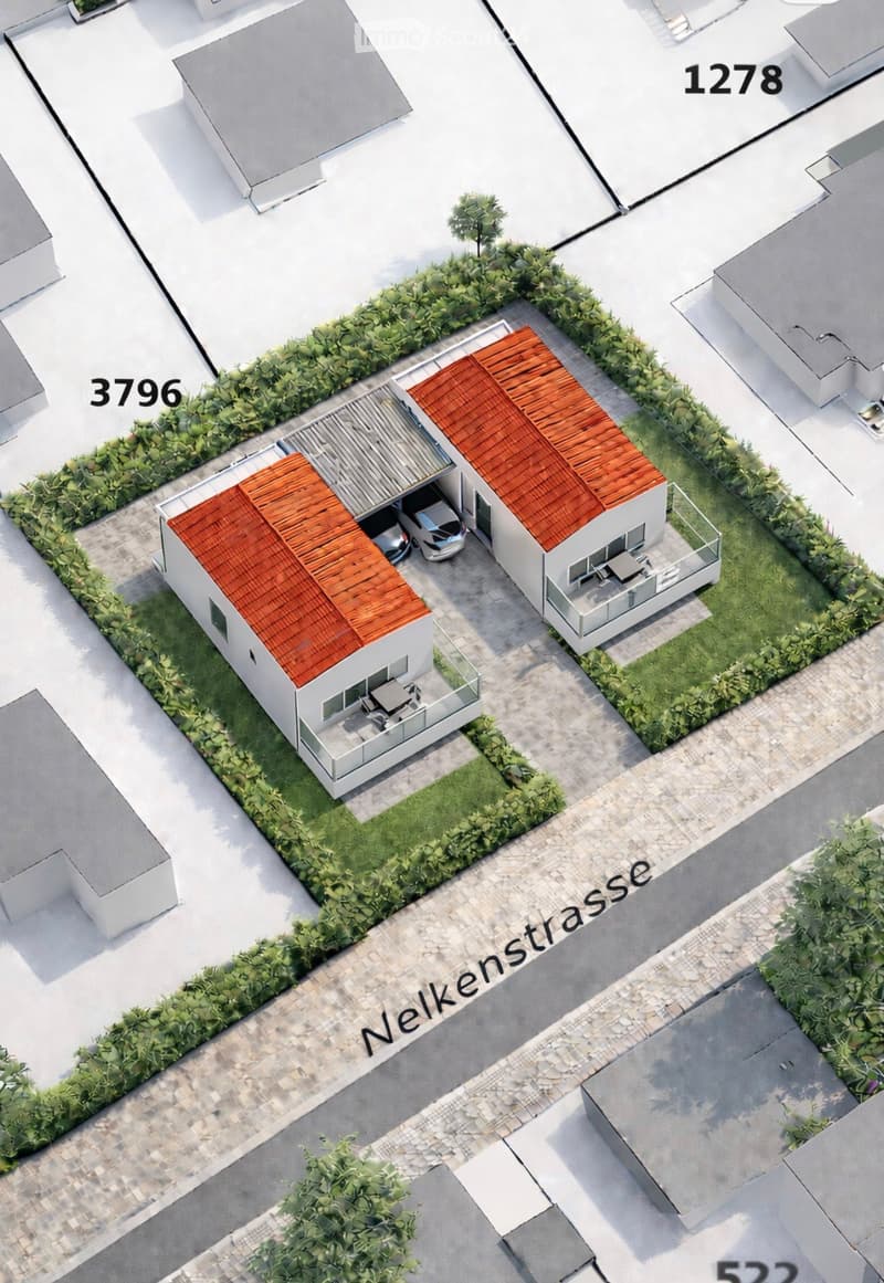 Aerial view of a residential area showing two modern houses with red-tiled roofs, surrounded by greenery, driveways, and numbered plots.