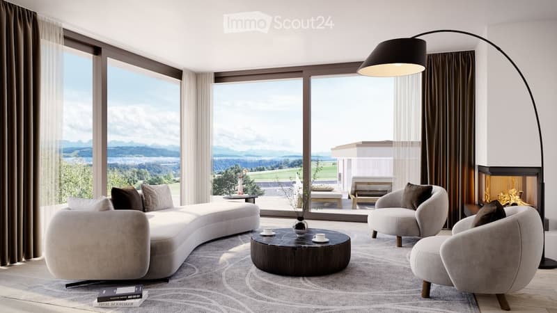 ample living room with fireplace, couch, and armchairs, large windows, wooden floor