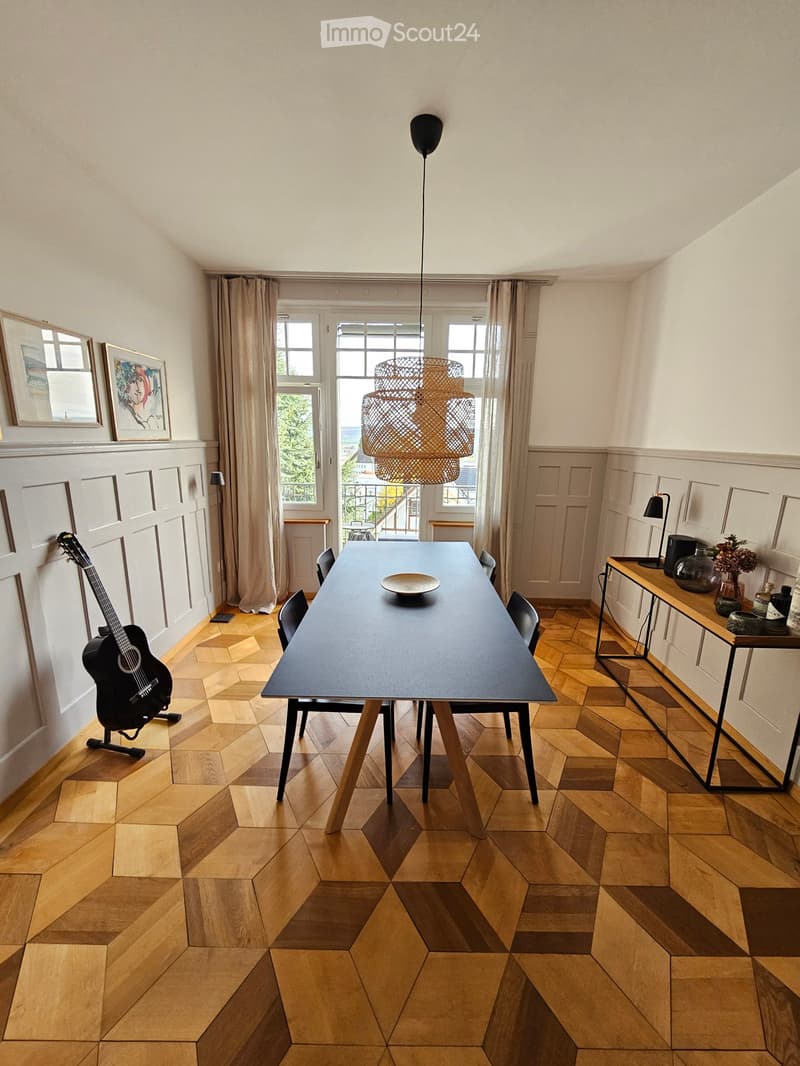 modern dining room, parquet floor, black dining table, glass windows, wooden table, white walls, lamp