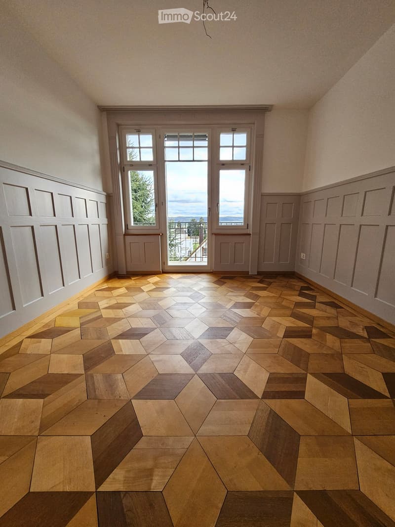 empty room, hardwood floors, white walls, large windows, balcony