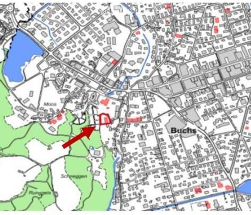 A detailed map of a city area showing streets, buildings, and landmarks. The map includes labeled areas such as "Moos," "Buchs," and "Schneggen," with a highlighted section indicated by a red arrow.