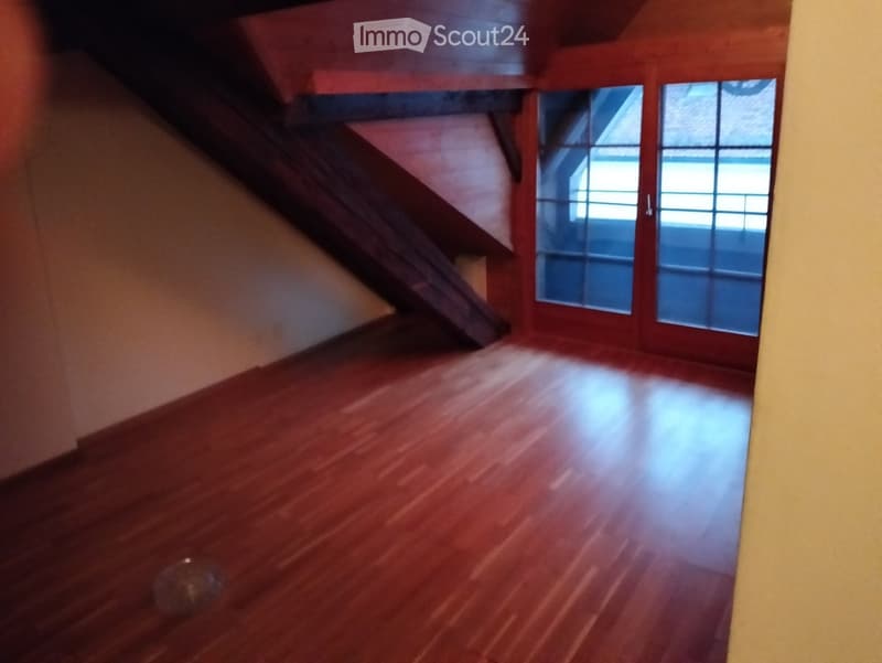 empty room, wooden floor, wooden beams, glass doors, wooden wall