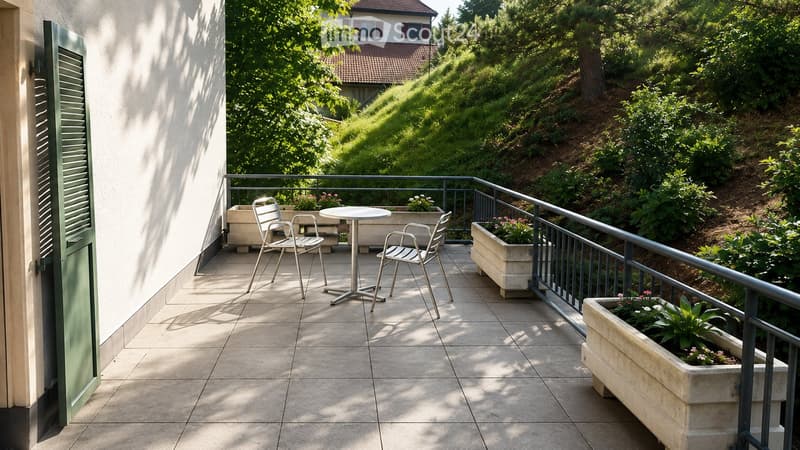Balcony with tiled floor, metal railing, small round table, four chairs, and several flower boxes.