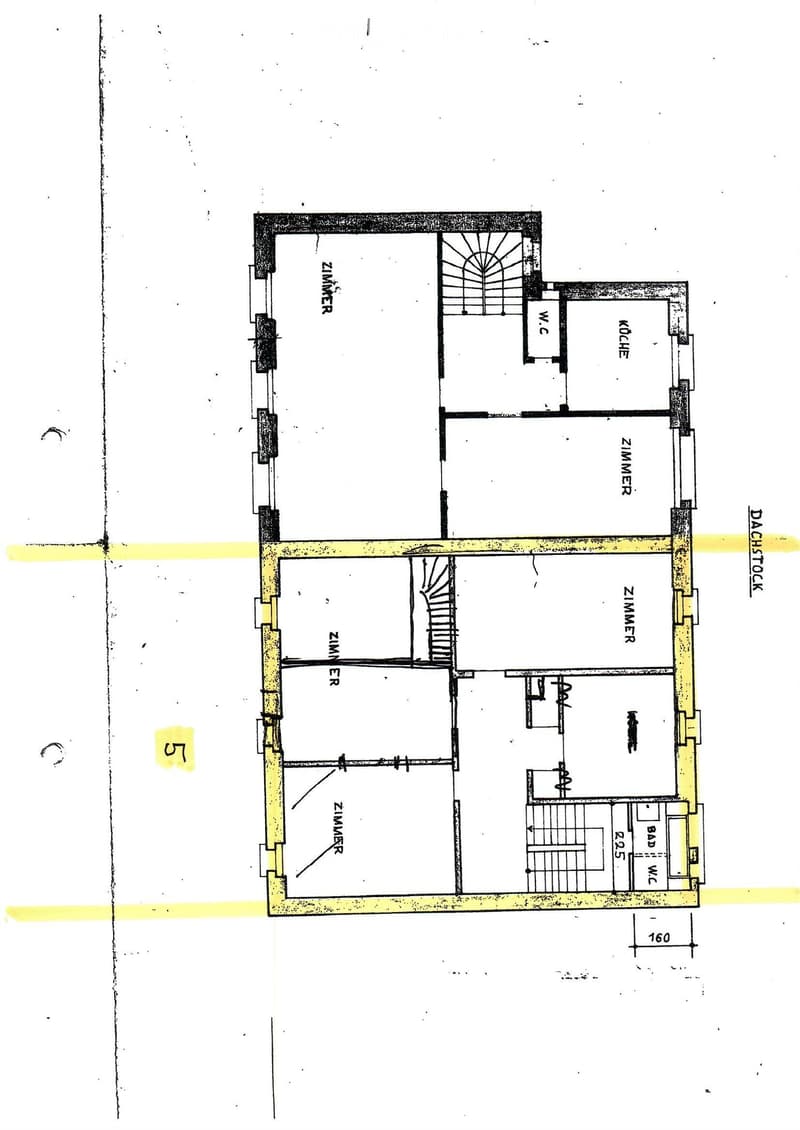 Floor plan of a residential unit with multiple rooms including a kitchen, living room, bedrooms, and a bathroom.