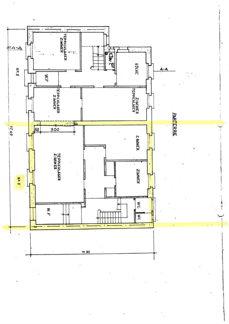 Floor plan showing a layout with multiple rooms including a kitchen, several bedrooms, and bathrooms.