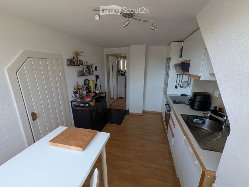 {"type": "Kitchen", "objects": ["sink", "faucet", "oven", "cutting board", "table", "chair", "cupboard", "fridge", "microwave", "kitchen island", "kitchen counter", "kitchen sink", "kitchen cabinet", "kitchen appliance", "kitchen sink", "kitchen faucet",
