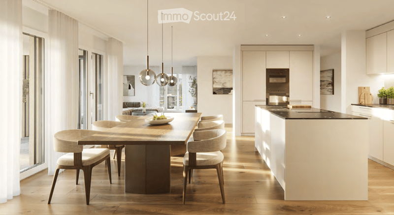 Open-plan kitchen and dining area with modern white cabinets, a central dining table with six chairs, pendant lights, and a kitchen island with bar stools.