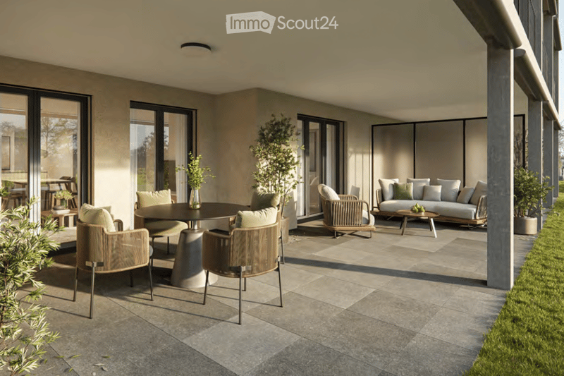 Modern outdoor patio with a round dining table, wicker chairs, a sofa, and decorative plants.