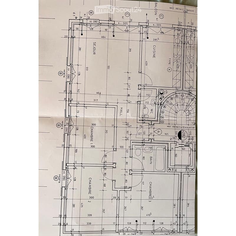 Floor plan showing a layout with two bedrooms, a bathroom, a hallway, a kitchen, and a balcony.