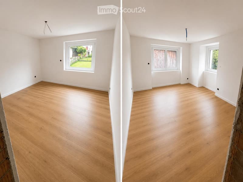 Two adjacent unfurnished rooms with light wooden flooring, white walls, and large windows offering views of a garden and outdoor area.