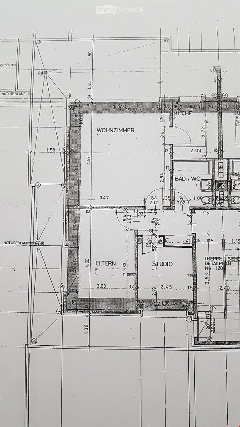 Floor plan showing a living room, kitchen, bathroom, studio, and hallway with dimensions and room labels.