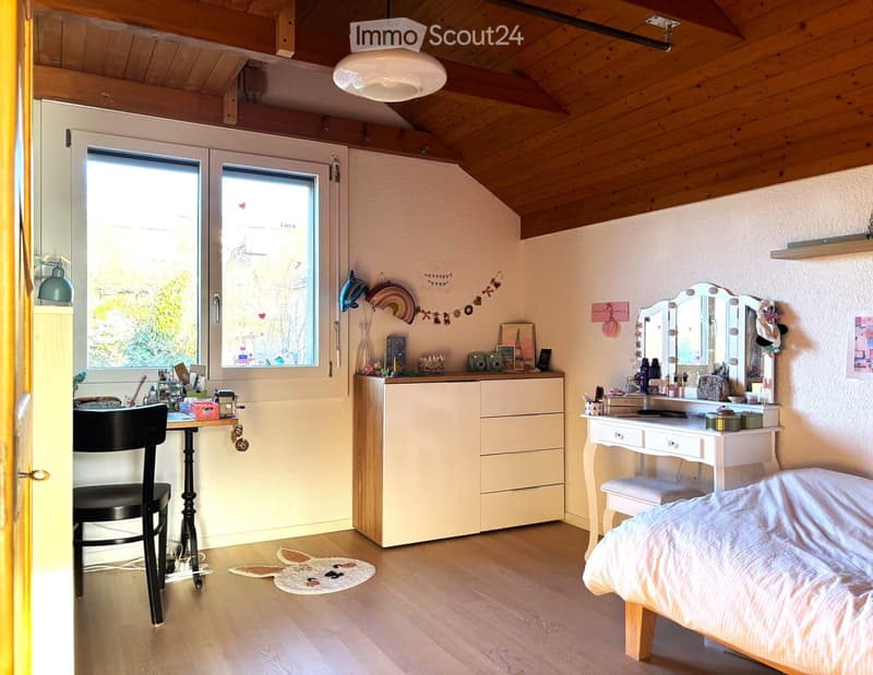 bedroom with wooden ceiling, bed, desk, chair, cabinet, mirror, double windows, decorative items