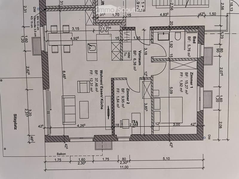 Floor plan showing a living area, kitchen, two bedrooms, and a bathroom, with a balcony.