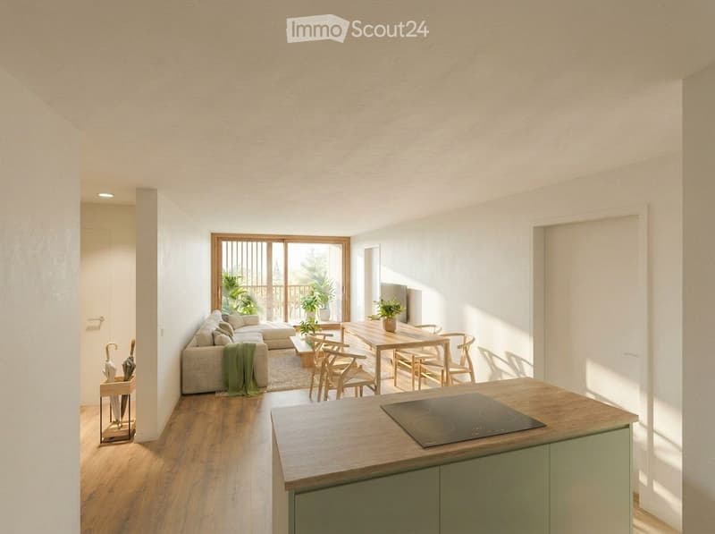 Bright, open-plan living and dining area with wooden flooring, large sliding glass doors leading to a balcony, a sofa, coffee table, dining table with chairs, and an induction cooktop.