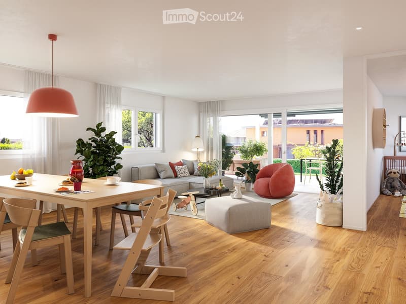 Bright, modern living and dining area with wooden flooring, large windows, and a sliding glass door leading to a patio. Features a grey sectional sofa, a round pink pouf, a wooden dining table with chairs, and various decorative items including plants and