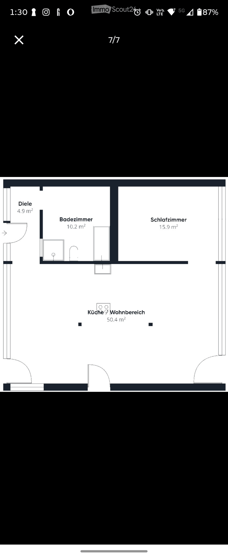 Floor plan showing a kitchen, living area, bedroom, bathroom, and hallway.