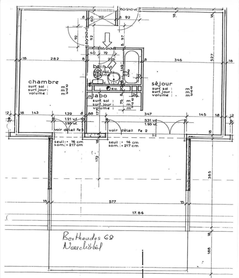 Floor plan showing a layout with labeled rooms including a bedroom, living room, and bathroom. Dimensions and measurements are indicated for each room and doorway.