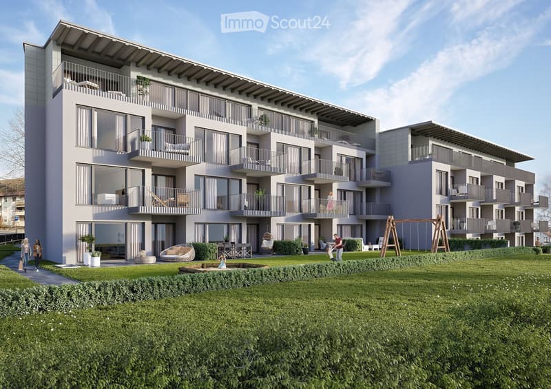 Modern architectural design with multiple balconies, a spacious garden, a small water feature, and outdoor play equipment.