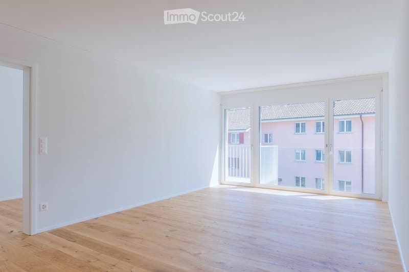 large glass windows, balcony, wooden floor, white walls