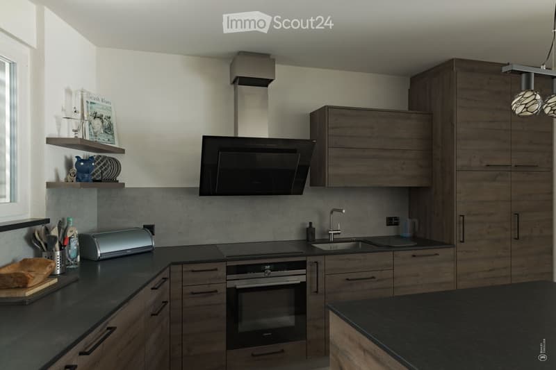 Modern kitchen with dark countertops, wooden cabinets, stainless steel appliances, and a central island.