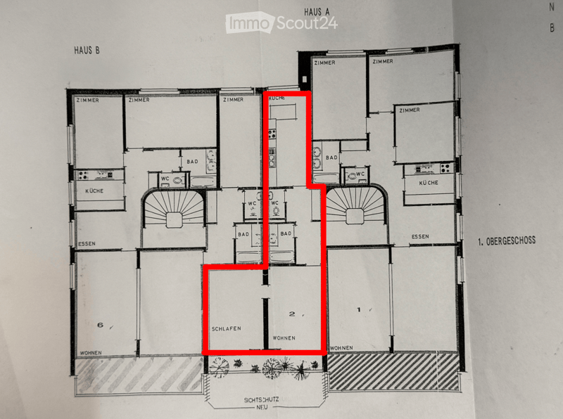 Floor plan of a two-story house with labeled rooms including living, sleeping, kitchen, bathrooms, and WC.