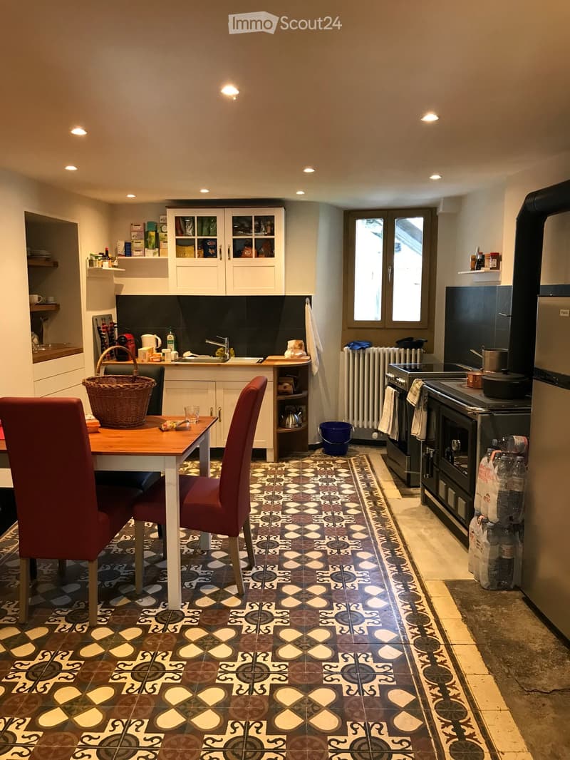 {"type": "Kitchen", "objects": ["table", "chair", "oven", "refrigerator", "sink", "faucet", "cupboard", "basket", "radiator", "cup", "bottle", "faucet", "oven", "refrigerator", "cupboard", "cupboard", "cupboard", "cupboard", "cupboard", "cupboard", "cupbo