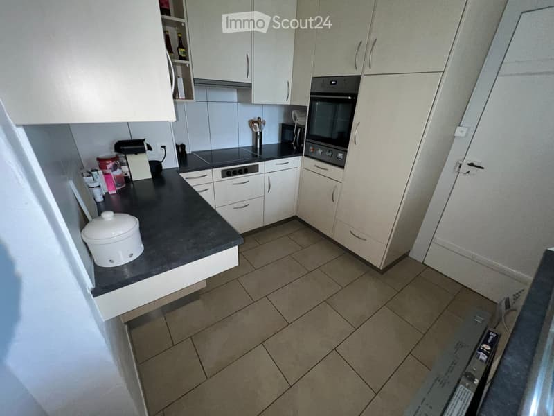{"type": "Kitchen", "objects": ["oven", "microwave", "kitchen island", "cupboard", "cup", "bottle", "oven mitt", "oven", "oven", "oven", "oven", "oven", "oven", "oven", "oven", "oven", "oven", "oven", "oven", "oven", "oven", "oven", "oven", "oven", "oven"