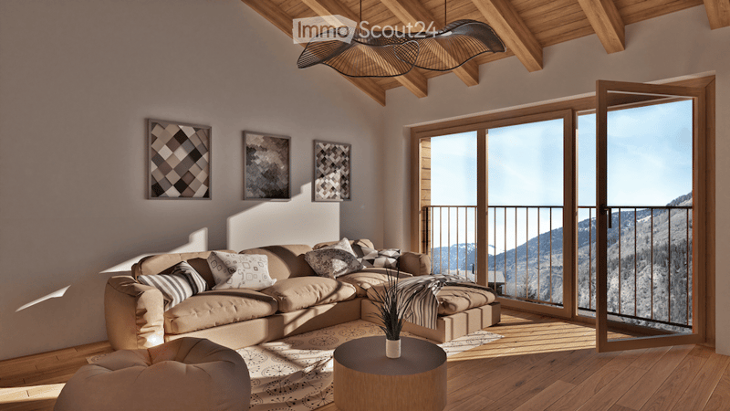 Modern living room with large windows and balcony access, featuring a beige sectional sofa, coffee table, ottoman, and artwork on the walls.