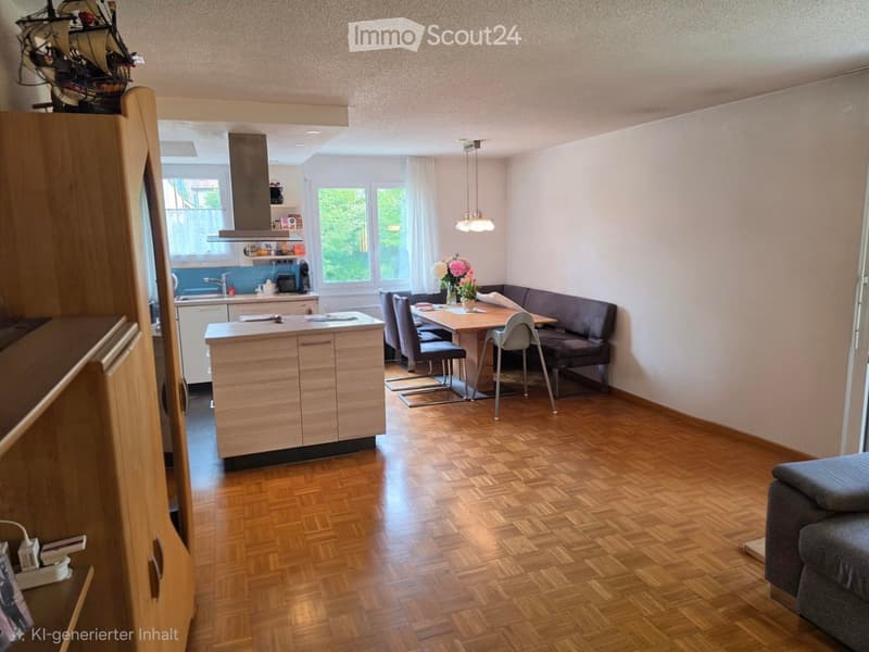 Open-plan living and dining area with wooden flooring, a sofa, dining table with chairs, kitchen island, and cabinets.